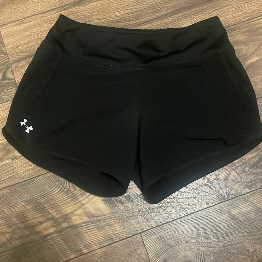 Under armor black shorts- not worn much- no rips or holes-